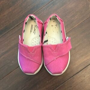 Worn maybe one time. Toms kids shoes